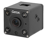 A compact black camera with a lens and multiple mounting points, designed for rugged use.