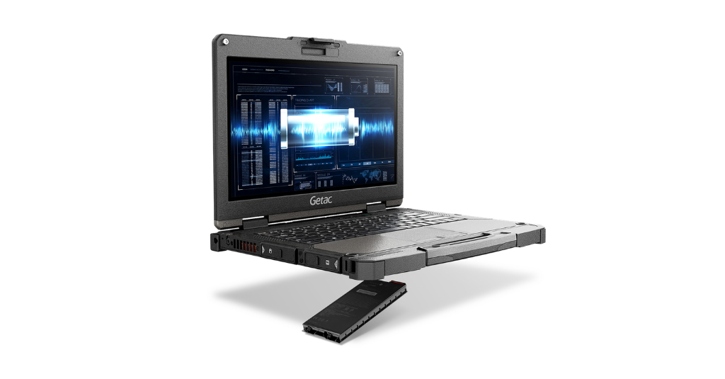 A Getac rugged laptop with its hot-swappable battery pack partially ejected from the base, displaying a data visualization dashboard on screen.