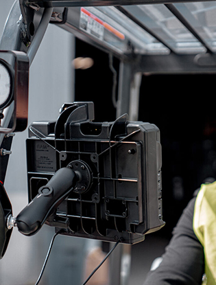 Male mechanic working on a commercial bus