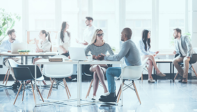 Casual working day. Group of young business people working and c