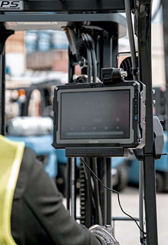 Getac rugged tablet mounted to a forklift upright in a distribution centre